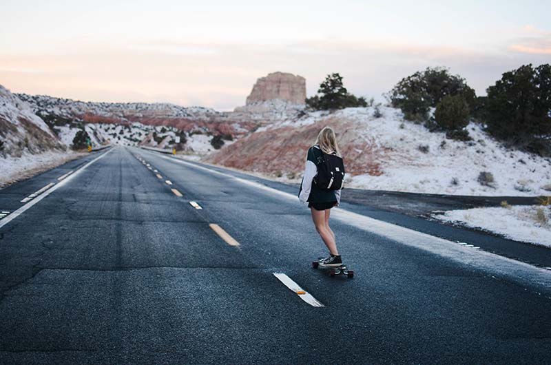 skater riding a longboard